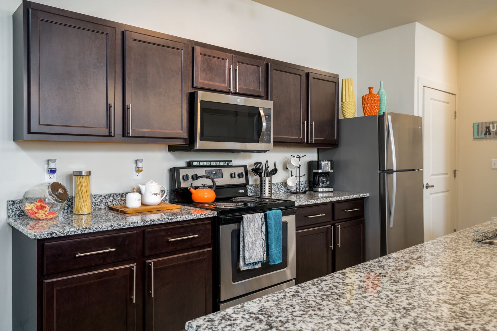 apartment kitchen with granite countertops